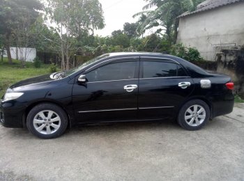 Toyota Corolla Altis AT 2014 - Cần bán Toyota Corolla Altis AT năm 2014, màu đen như mới  