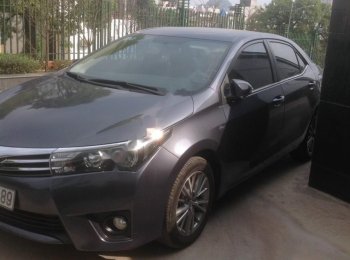 Toyota Corolla Altis 1.8G AT 2014 - Bán Toyota Corolla altis 1.8G AT sản xuất 2014 chính chủ, 650 triệu
