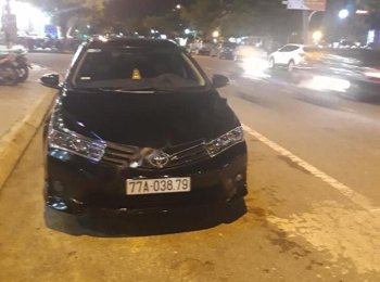 Toyota Corolla Altis 1.8G MT 2014 - Bán gấp Toyota Corolla altis 1.8G MT đời 2014, màu đen, số tự động