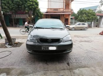 Toyota Corolla Altis 1.8G MT 2005 - Cần bán gấp Toyota Corolla altis 1.8G MT sản xuất 2005, màu xám