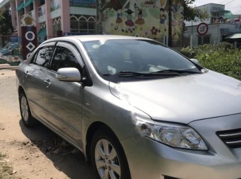 Toyota Corolla Altis 1.8G 2009 - Bán xe Toyota Corolla altis 1.8G năm sản xuất 2009, màu bạc như mới, 409 triệu