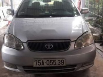 Toyota Corolla Altis 2002 - Chính chủ bán Toyota Corolla altis sản xuất 2002, màu bạc, xe nhập