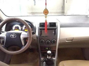 Toyota Corolla Altis MT 2013 - Cần bán lại xe Toyota Corolla altis MT 2013, màu đen giá cạnh tranh