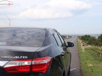Toyota Corolla Altis 1.8G AT 2017 - Cần bán lại xe Toyota Corolla altis 1.8G AT 2017, màu đen như mới 