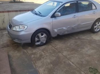 Toyota Corolla Altis 1.8G MT 2003 - Bán Toyota Corolla altis 1.8G MT đời 2003, màu bạc, giá 215tr