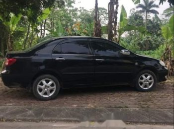 Toyota Corolla 2006 - Cần bán gấp Toyota Corolla năm sản xuất 2006, màu đen chính chủ, giá chỉ 305 triệu