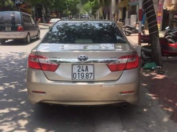 Toyota Camry 2013 - Cần bán Toyota Camry đời 2013, màu vàng, xe nhập chính chủ, 730 triệu
