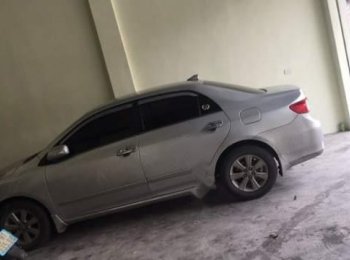 Toyota Corolla Altis  1.8G  2011 - Bán Toyota Corolla Altis 1.8G sản xuất 2011, màu bạc xe gia đình, 545 triệu