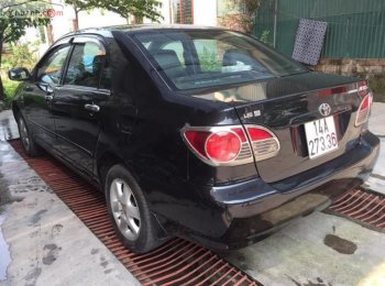 Toyota Corolla Altis 1.8G MT 2005 - Bán Toyota Corolla altis 1.8G MT sản xuất năm 2005, màu đen số sàn, giá chỉ 285 triệu
