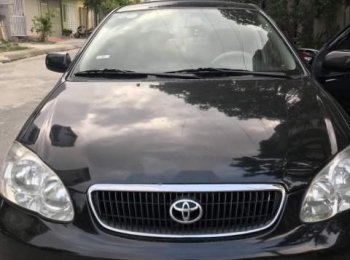 Toyota Corolla Altis   2003 - Cần bán gấp Toyota Corolla altis năm 2003, màu đen, xe đẹp 