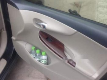 Toyota Corolla Altis 2011 - Chính chủ bán xe Toyota Corolla altis đời 2011, màu đen