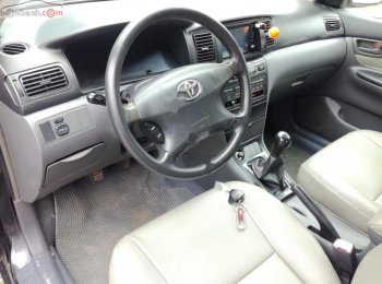 Toyota Corolla Altis 1.8G MT 2004 - Bán xe Toyota Corolla Altis 1.8G MT năm sản xuất 2004, màu đen, giá chỉ 245 triệu