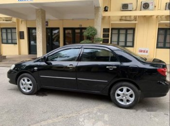 Toyota Corolla Altis    2005 - Bán xe Corolla Altis đời 2005 màu đen, số sàn, xe công chức sử dụng đi rất ít và giữ gìn