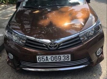 Toyota Corolla Altis 2.0V AT 2015 - Bán ô tô Toyota Corolla altis 2.0V AT đời 2015, màu nâu xe gia đình