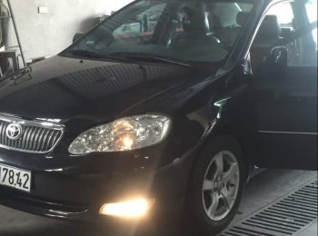 Toyota Corolla Altis 1.8AT 2003 - Bán xe Toyota Corolla altis 1.8AT năm sản xuất 2003, màu đen, xe nhập