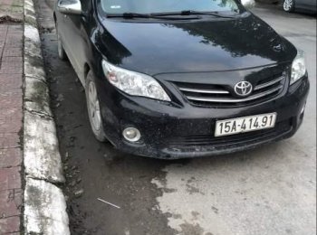 Toyota Corolla Altis   2010 - Bán Toyota Corolla Altis sản xuất 2010, màu đen chính chủ, giá tốt