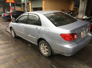 Toyota Corolla Altis 2003 - Cần bán Toyota Corolla altis sản xuất 2003, màu bạc, giá chỉ 235 triệu