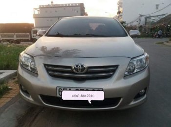Toyota Corolla Altis 2010 - Bán Toyota Corolla Altis năm sản xuất 2010, màu bạc xe gia đình