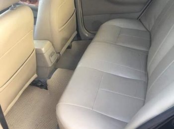 Toyota Corolla Altis  MT 2003 - Bán xe Toyota Corolla altis MT đời 2003, màu đen, xe nhập, xe gia đình sử dụng