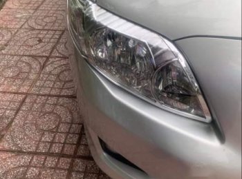 Toyota Corolla Altis 2010 - Cần bán xe Toyota Corolla altis năm sản xuất 2010, màu bạc, nhập khẩu nguyên chiếc xe gia đình, giá 380tr