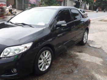 Toyota Corolla Altis 2.0 2009 - Bán xe Toyota Corolla altis 2.0 đời 2009, màu đen chính chủ