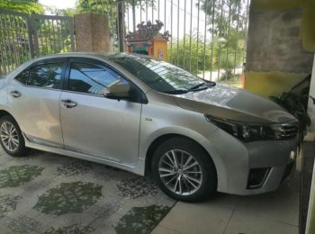 Toyota Corolla Altis    2015 - Bán Toyota Corolla altis đời 2015, màu bạc, không đậm đúng thủy kích