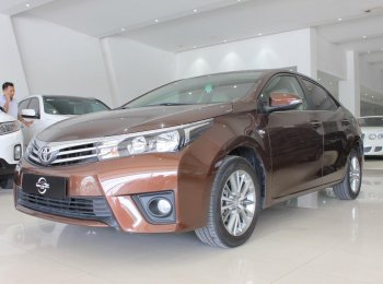 Toyota Corolla Altis G 2016 - Cần bán Toyota Corolla altis G sản xuất 2016, màu nâu