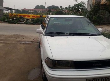 Toyota Corolla 1990 - Bán xe Toyota Corolla năm 1990, màu trắng, nhập khẩu nguyên chiếc