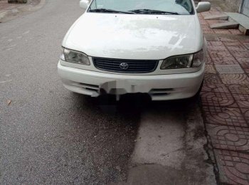 Toyota Corolla 1998 - Cần bán Toyota Corolla đời 1998, màu trắng xe gia đình, 90tr