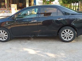 Toyota Corolla 2008 - Cần bán lại xe Toyota Corolla GLi 1.8 AT năm sản xuất 2008, màu đen, xe nhập, giá chỉ 390 triệu