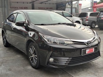 Toyota Corolla 1.8G AT  2019 - Cần bán xe Toyota Corolla Altis 1.8G AT sản xuất 2019, màu nâu chính chủ