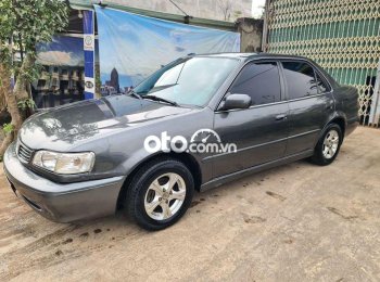 Toyota Corolla 1.6GLi 2001 - Cần bán lại xe Toyota Corolla 1.6GLi năm sản xuất 2001, màu xám, giá chỉ 125 triệu