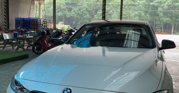 2012 - Bán xe cũ BMW 320i sản xuất năm 2012, xe nhập