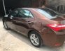 Toyota Corolla Altis 2014 - Cần bán gấp Toyota Corolla Altis đời 2014, màu nâu đã đi 48000 km, 650 triệu