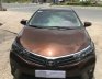 Toyota Corolla Altis 2014 - Cần bán gấp Toyota Corolla Altis đời 2014, màu nâu đã đi 48000 km, 650 triệu