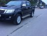 Toyota Hilux 4x2MT 2014 - Cần bán lại xe Toyota Hilux đời 2014, màu đen, nhập khẩu nguyên chiếc, 490tr