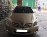 Toyota Camry LE 2010 - Cần bán xe Toyota Camry LE 2010, màu vàng, nhập khẩu