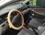 Toyota Corolla J 1.3 MT 2003 - Cần bán xe Toyota Corolla J 1.3 MT đời 2003, màu trắng chính chủ