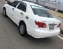 Toyota Corolla J 1.3 MT 2003 - Cần bán xe Toyota Corolla J 1.3 MT đời 2003, màu trắng chính chủ