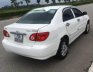 Toyota Corolla J 1.3 MT 2003 - Cần bán xe Toyota Corolla J 1.3 MT đời 2003, màu trắng chính chủ