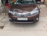Toyota Corolla Altis 1.8G 2016 - Chính chủ bán xe Toyota Corolla altis 1.8G đời 2016, màu nâu