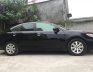 Toyota Carina 2010 - Cần bán lại xe Toyota Carina đời 2010, màu đen, xe nhập số tự động