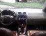 Toyota Corolla Altis 1.8G MT 2009 - Bán xe Toyota Corolla altis 1.8G MT 2009, màu trắng