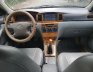 Toyota Corolla Altis 1.3 MT 2003 - Bán Toyota Corolla Altis đời 2003, màu trắng xe gia đình, giá 238tr