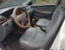 Toyota Corolla Altis 1.3 MT 2003 - Bán Toyota Corolla Altis đời 2003, màu trắng xe gia đình, giá 238tr