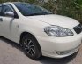 Toyota Corolla Altis 1.3 MT 2003 - Bán Toyota Corolla Altis đời 2003, màu trắng xe gia đình, giá 238tr