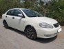 Toyota Corolla Altis 1.3 MT 2003 - Bán Toyota Corolla Altis đời 2003, màu trắng xe gia đình, giá 238tr