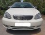 Toyota Corolla Altis 1.3 MT 2003 - Bán Toyota Corolla Altis đời 2003, màu trắng xe gia đình, giá 238tr