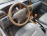 Toyota Corolla Altis 1.3 MT 2003 - Bán Toyota Corolla Altis đời 2003, màu trắng xe gia đình, giá 238tr