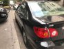 Toyota Corona  G 1.8  2004 - Cần bán gấp Toyota Corona G 1.8 sản xuất 2004, màu đen số sàn